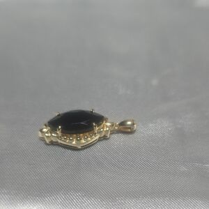 Dainty Black and Gold Oval Pendant with Filigree Design